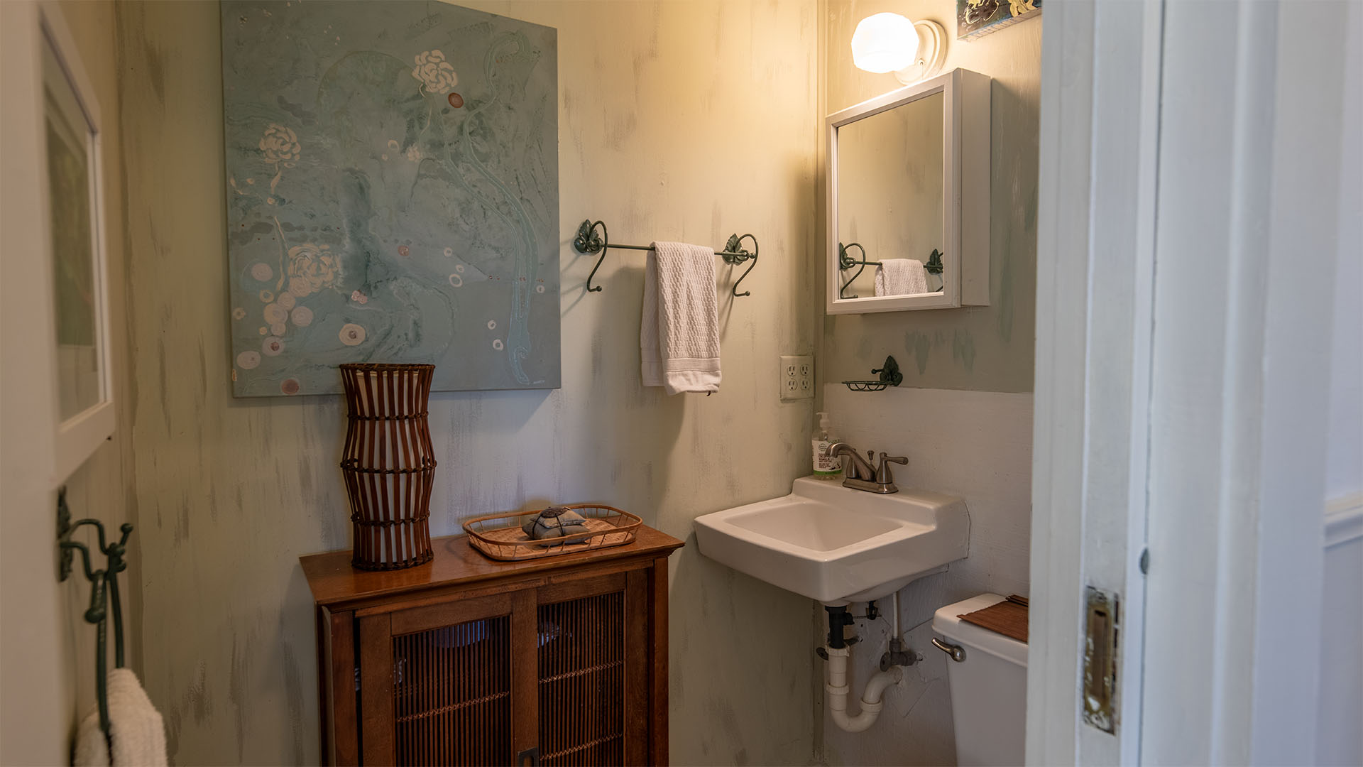 Half bath off kitchen in Scottsville home