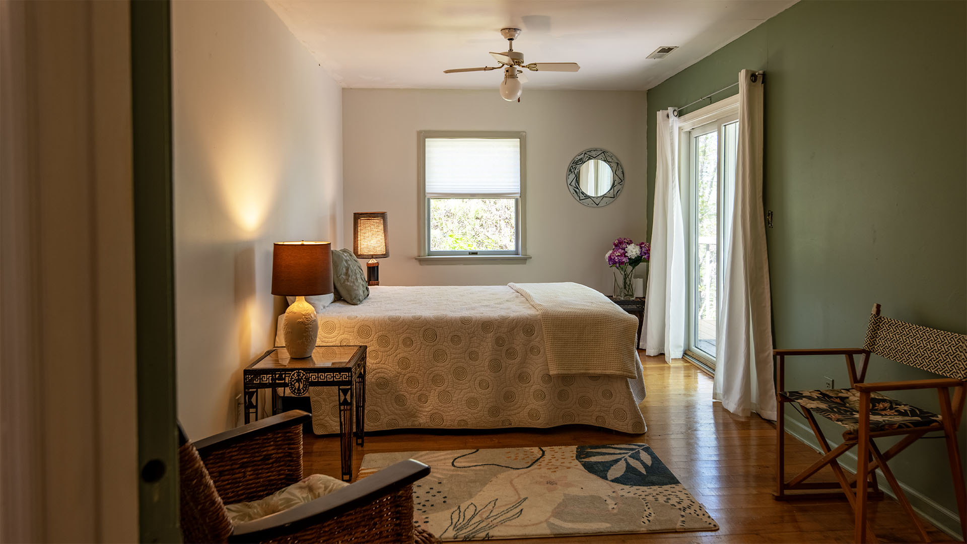 Bedroom with deck access in Scottsville home