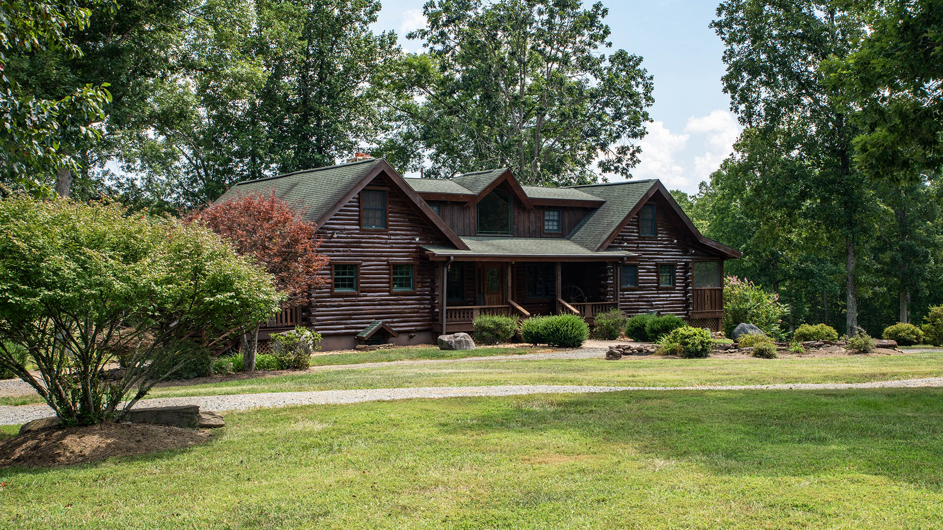 log home exterior at Louisa County Virginia horse farm for sale
