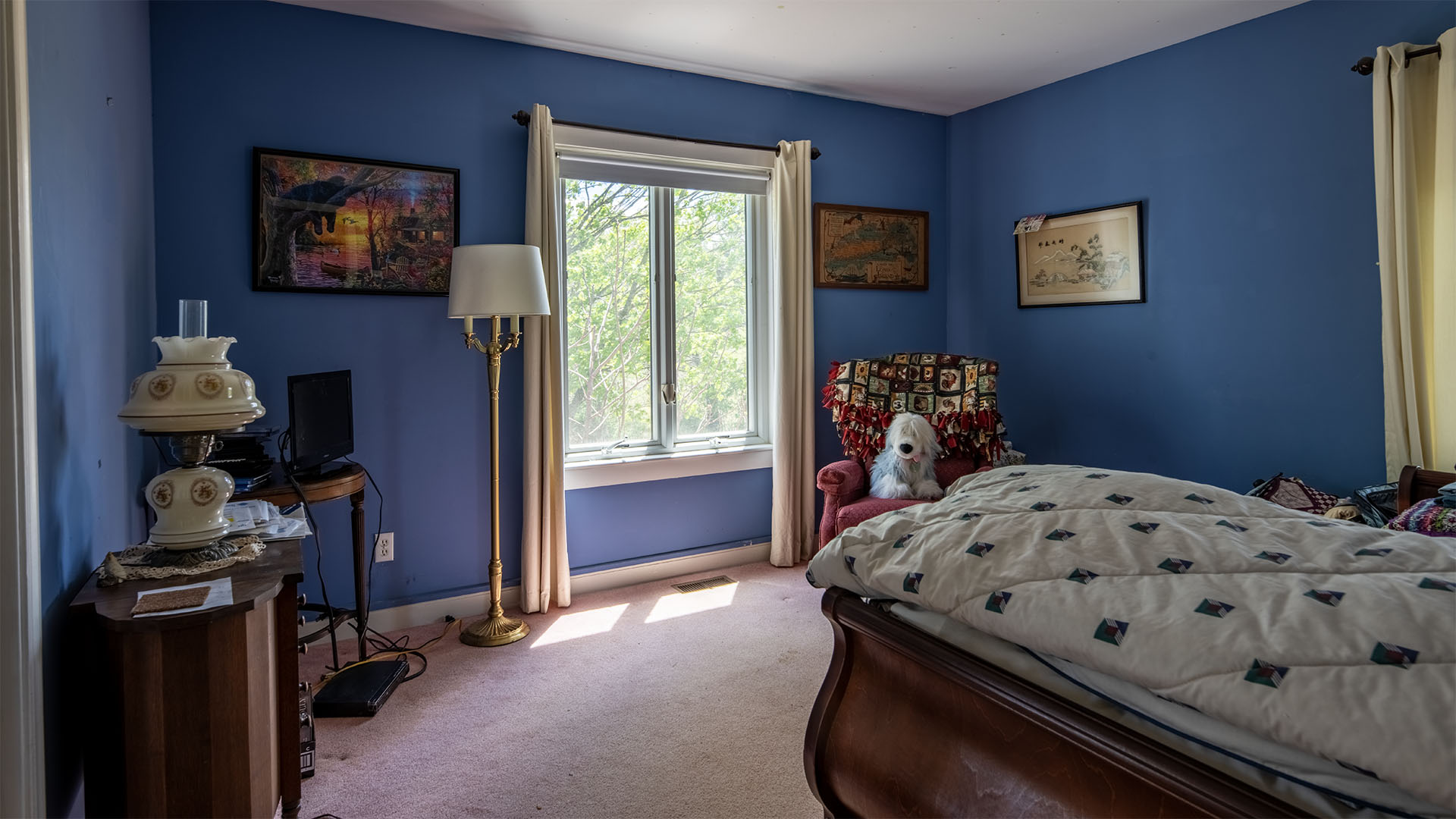 Bedroom at Asgardd Farm in Afton VA with blue walls, natural light and peaceful rural setting