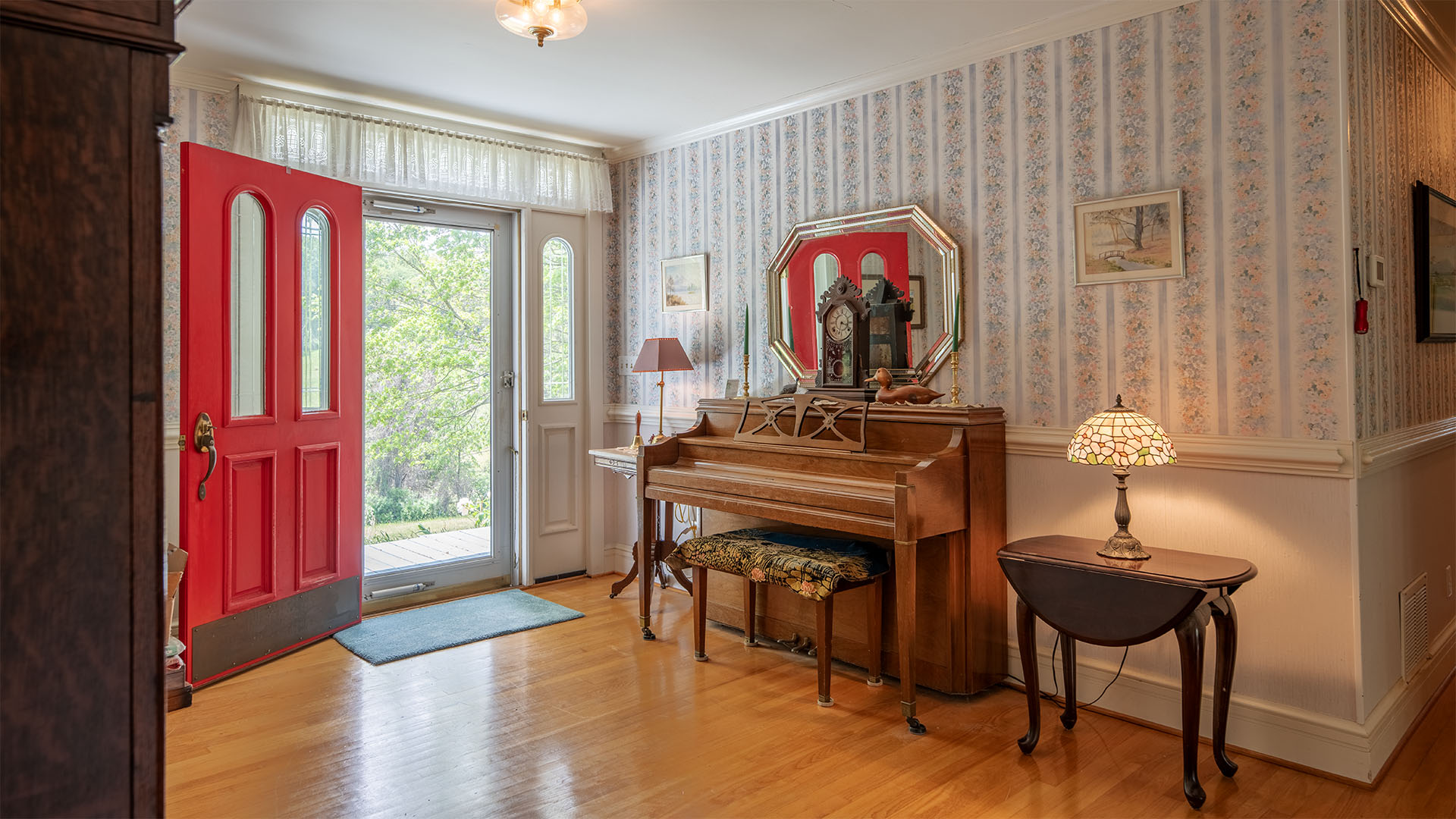 Foyer at Asgardd Farm in Afton VA with hardwood floors, front entry and classic farmhouse details