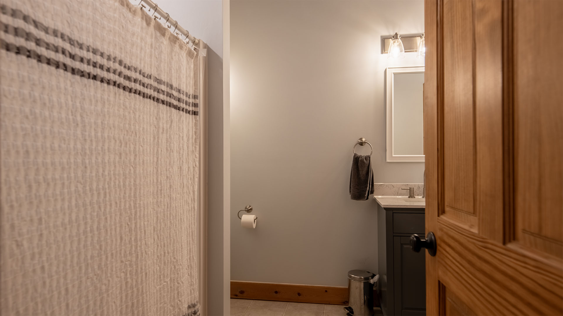 Renovated main-level bathroom in the log home at 3638 Oak Park Road