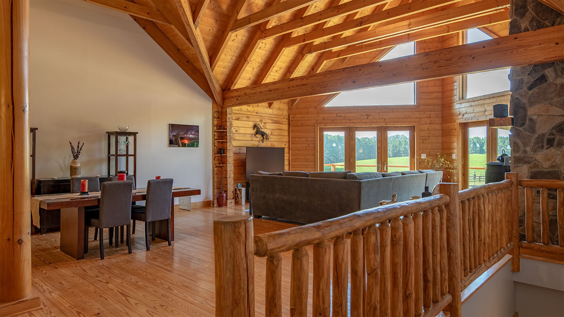 Open living area in the Madison County log home at 3638 Oak Park Road