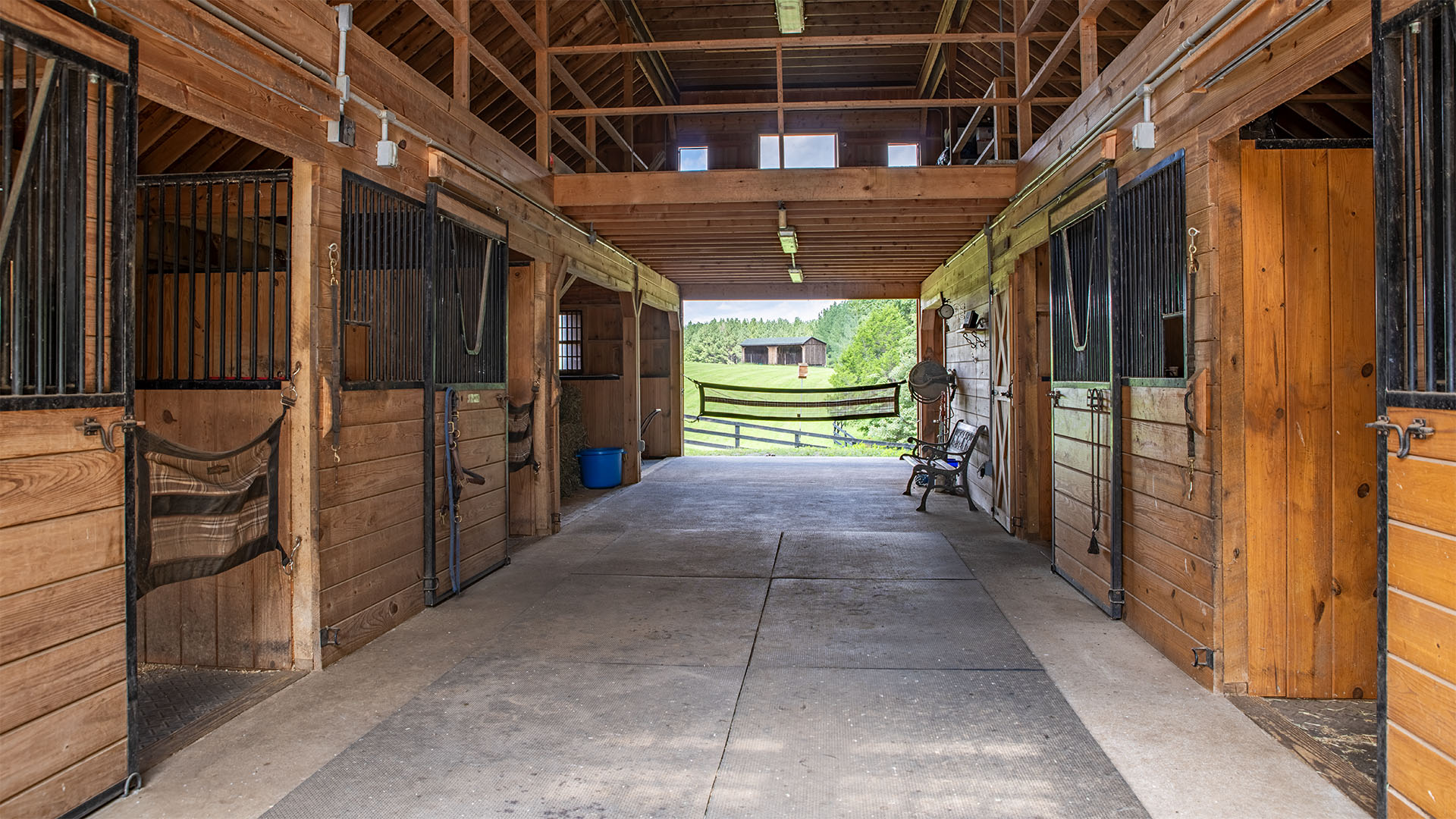 Center aisle inside the Groffdale horse stable at 3638 Oak Park Road
