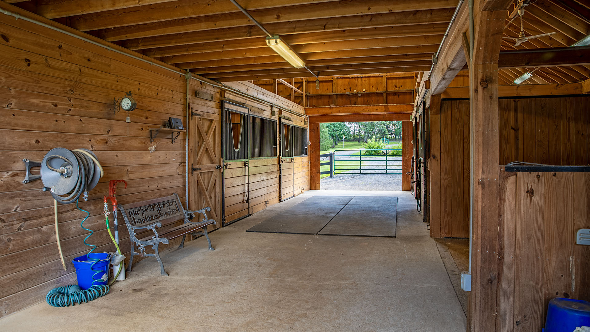 Four-stall horse stable with matted 12 by 12 stalls at 3638 Oak Park Road