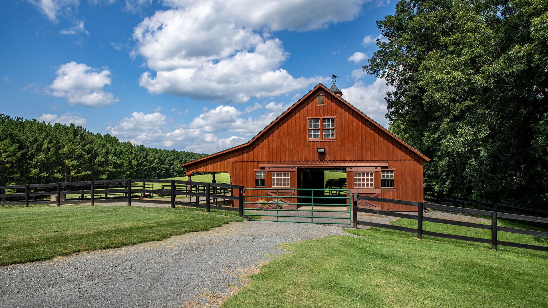 Groffdale Barns center-aisle stable at the 44-acre Madison Virginia horse farm